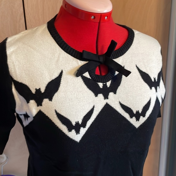 Hell Bunny white and black knit top with bat details and black bow. - Picture 2 of 6